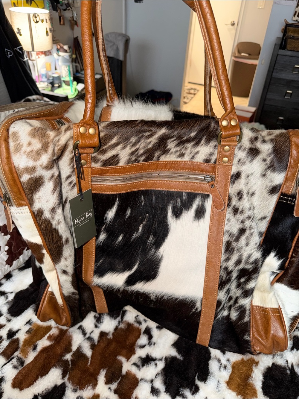 Myra Bag Black White and Brown Cowhide Travel Weekender